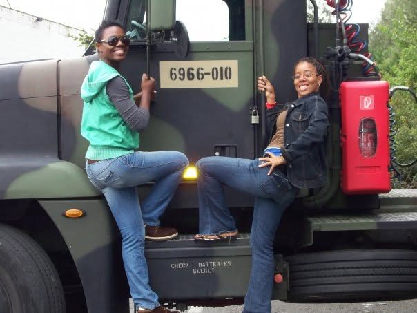 Kadine Reynolds and a friend on a military truck, Belgium