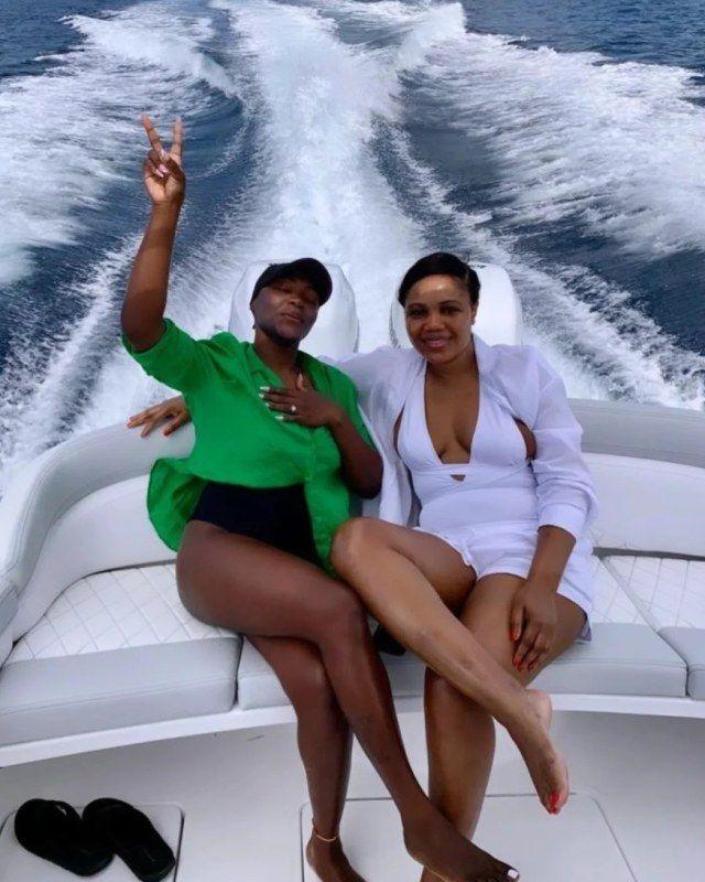 Kadine Reynolds and a friend on a boat, Dominican Republic