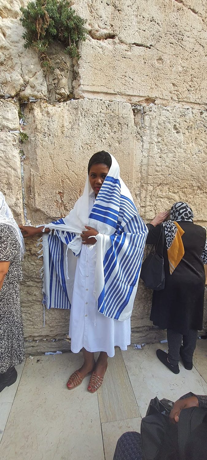 Kadine Reynolds wrapped in a tallit at the Western Wall, Jerusalem, Israel