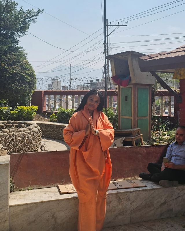 Kadine Reynolds: Standing in front of the Nepali flag, Nepal