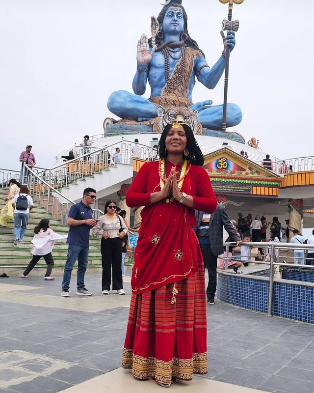 Kadine Reynolds: Beneath the great Shiva statue, Nepal