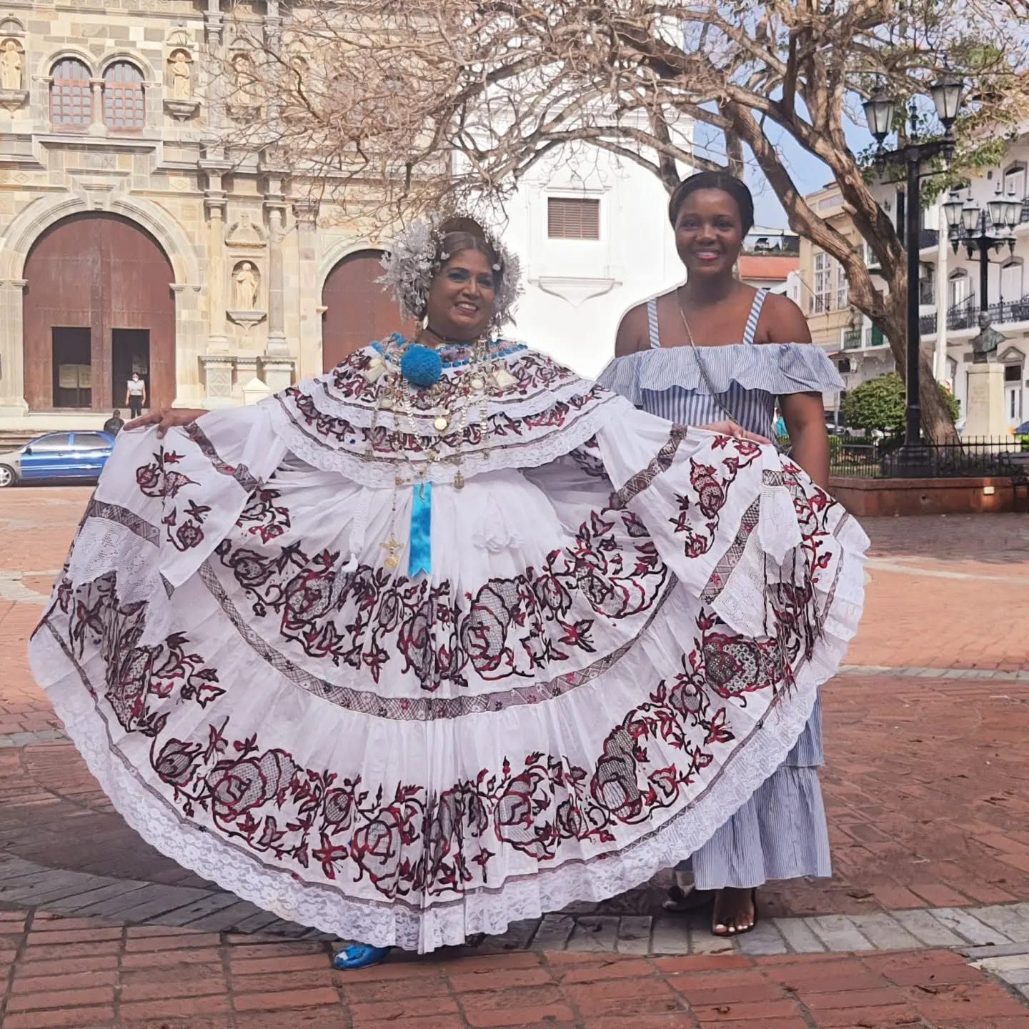 Kadine Reynolds with a woman in a traditional pollera, Panama City, Panama